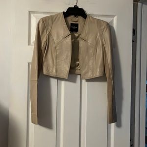 Cropped faux leather Bebe jacket.